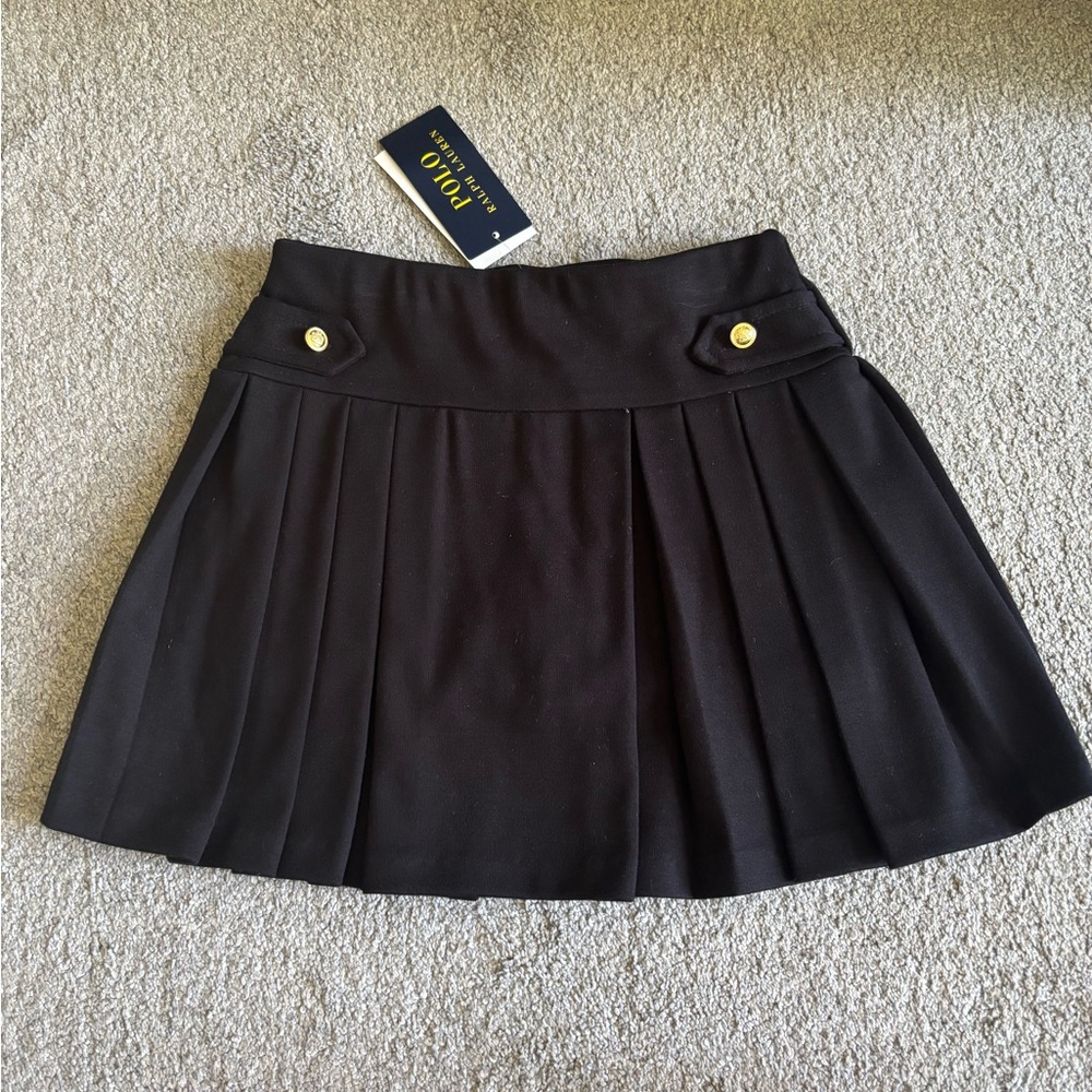RL girls black pleated skirt with gold buttons and built in shorts. Size 6, NWT